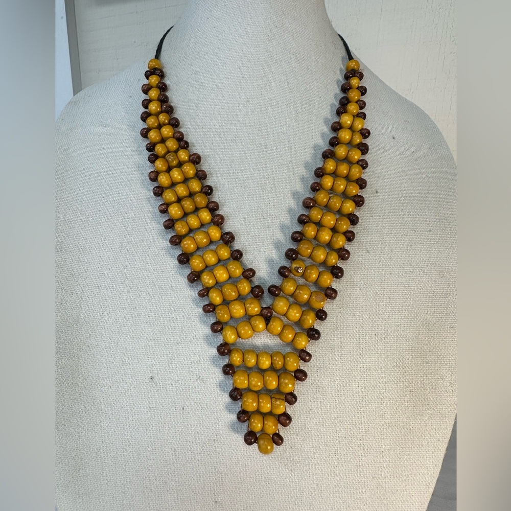 Unusual yellow and brown wooden bead necklace